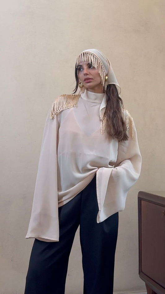 Alleria- Blusa mezzocollo con frange sulle spalle Avorio